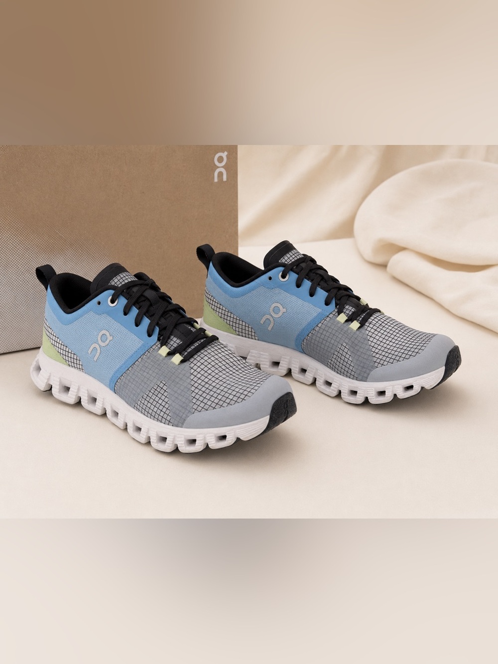On Running Men’s Cloud Trainer in Light Blue, Gray and Lime Accent
